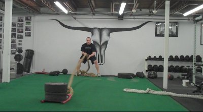 Heavy rope rows fitness routine training.