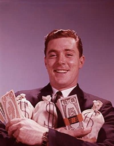 Vintage man holding cash bags.