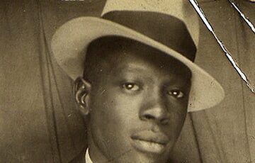 A man wearing a men's hat.