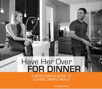 A man cooking in kitchen and smiling at sitting girl.