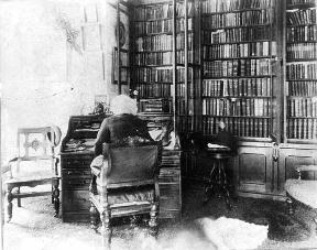 Frederick Douglass cedar hill office library sitting at desk.