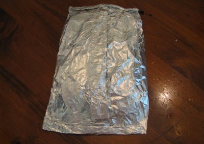 Aluminium Foil packet for making meals over campfire camping.