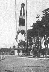 Vintage gymnast on rings. 