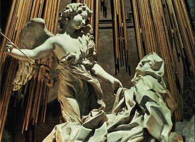 A Baroque period sculpture featuring a statue of an angel and a statue of a woman.