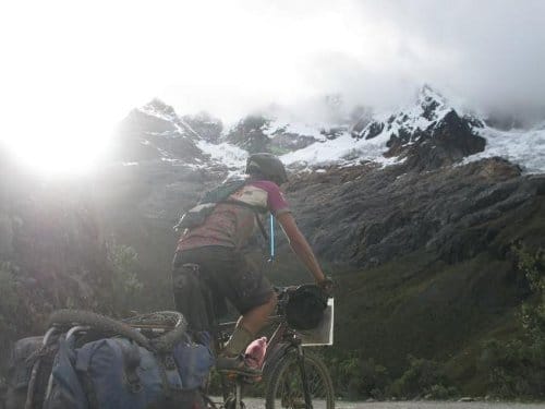 Bike rider in mountains pass riding the spine route.