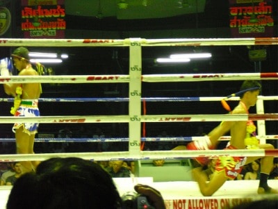 The fighters preparing in the ring.