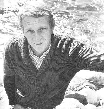 Steve Mcqueen in cardigan shawl collar sweater.