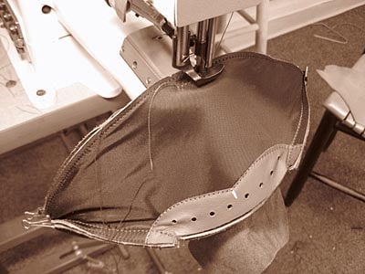 With a heavy duty industrial sewing machine, A football is sewn together. industrial sewing machine making footballs