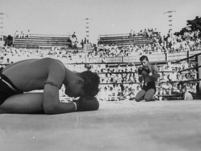 Boxers praying before the match.