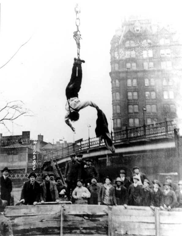 HO-17 harry houdini hanging off ground straight jacket