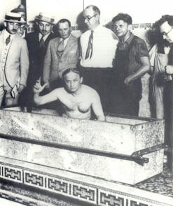 Harry Houdini after escaping airtight coffin submerged underwater.
