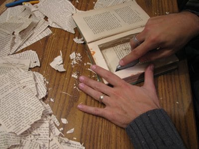 Book cutting off from the center to make a secret compartment. 