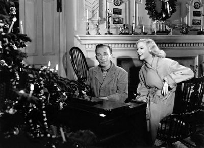 Husband playing piano for his wife.