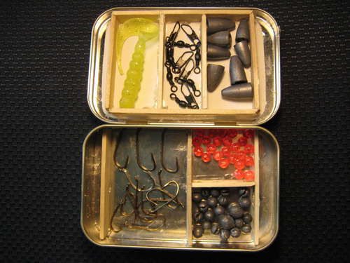 Altoids tin using for fishing tackle box.