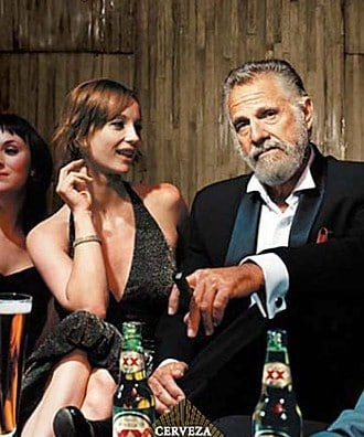 Most interesting man in the world Dos Equis drinking beer.