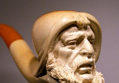 A Meerschaum pipe, resembling the King of Pipes, featuring a man's head.