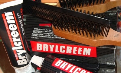 Brylcreem tubes with hair brush. 