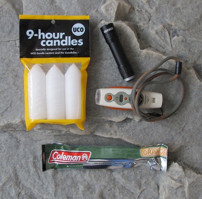 bug out bag supplies lighting candles flashlight 