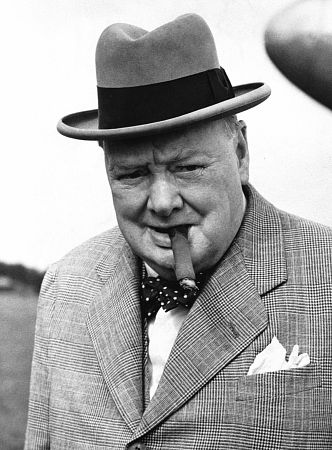 Winston Churchill giving pose with cigar. 