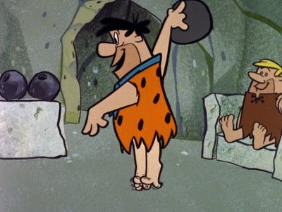 Fred Flinstone play bowling ball with tippy toes. 