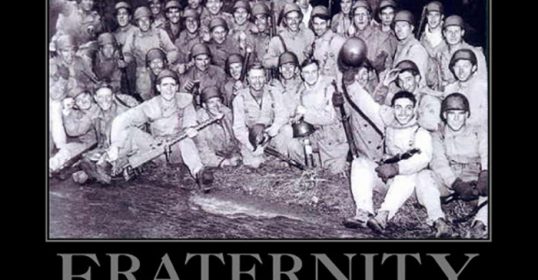 A group of people are posing for a photo with the words 