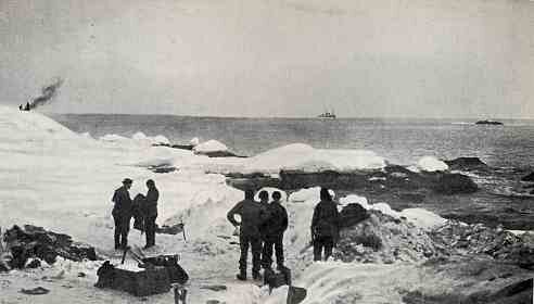 A black and white photo of a group of people on the ice, signaling for help with distress signals during a wilderness survival scenario.