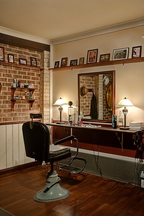 Set up of a barber shop in a garage.