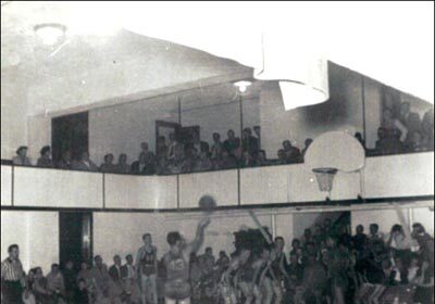 An old black and white photo capturing a clutch basketball game moment.