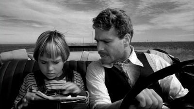 Paper moon movie father and son in car driving.