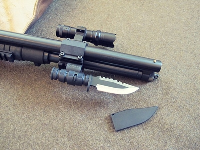 Survival shotgun modified zombie apocalypse mounted flashlight.