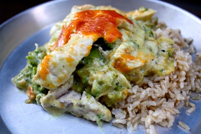 Chicken casserole divan rice broccoli served in the plate.