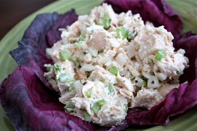 Chicken salad with cabbage in the plate.