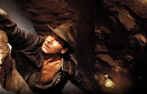 Indy hanging off from the cliff in Indiana Jones and the Last Crusade movie.