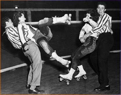 Vintage couples cheering on a roller in derby duke club.