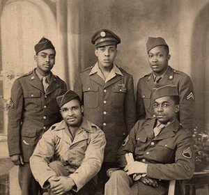 A group of trusted men in military uniforms posing for an important photo.