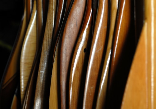 collection of canoe wooden paddles up close photo 