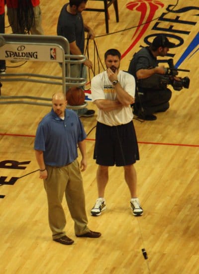 Shawn windle NBA strength coach at court floor.