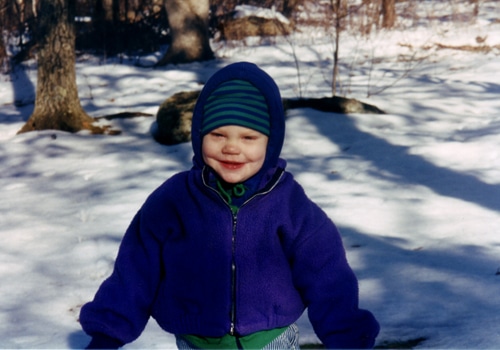 A kid in a snow.