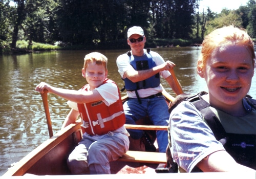 A family doing boating.