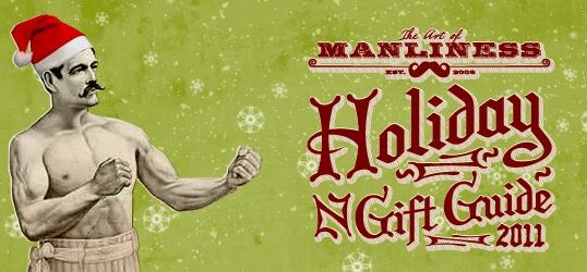 A man in a Santa Claus hat showcasing the Holiday Gift Guide from 2012.