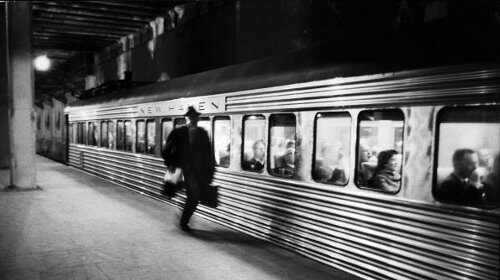 A life-changing photograph of a train at a station, captured in black and white.