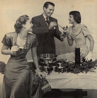 Vintage party host serving drinks to ladies.