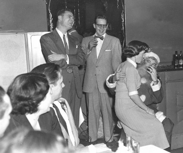 santa2 vintage holiday party woman sitting in santa's lap