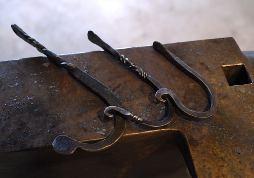Handmade metal hooks.