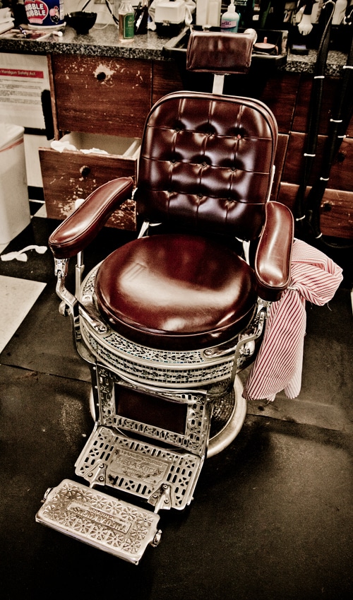 A metal casing chair at barbershop.