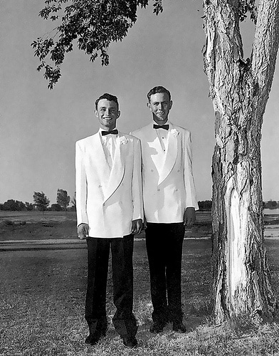Vintage men wearing double-breasted tuxedos. 