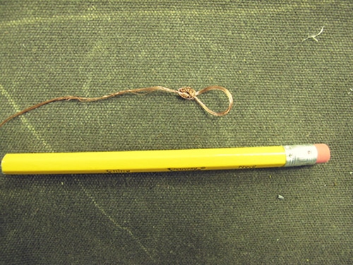 Folding wire with pencil.