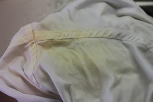 White dress shirt yellow armpit stains after ammonia soaking.