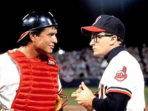 Two players having a chat in a baseball match.