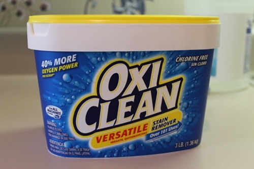 Tub of oxiclean versatile stain remover.